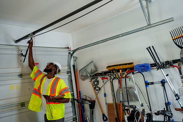 Professional Garage Door Panel Replacement technician working in Barton County County, KS
